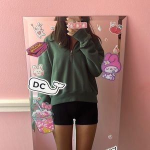 Dark green half-zip up sweater